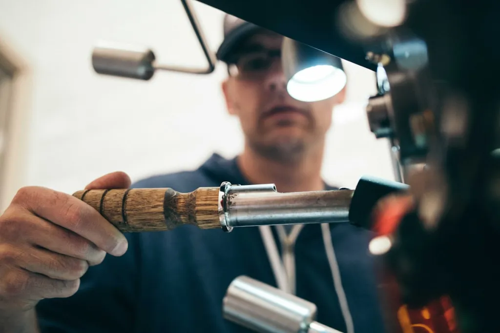 Machinist operating a lathe