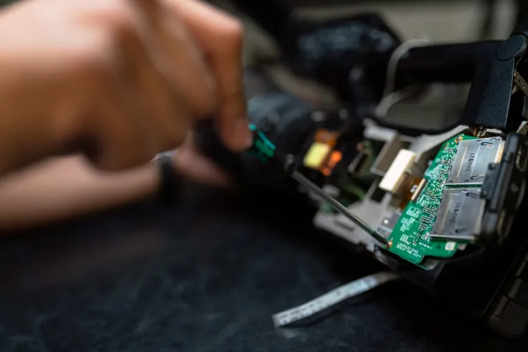 Technician repairing a circuit board