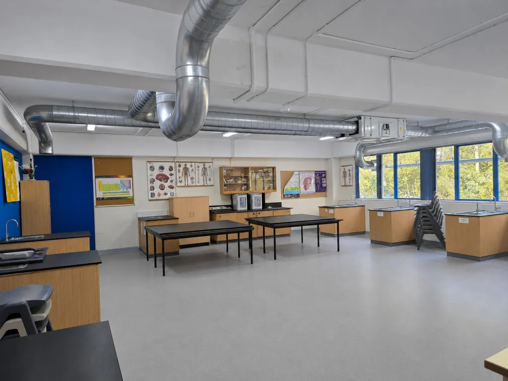 School science classroom with exposed spiral ventilation ductwork